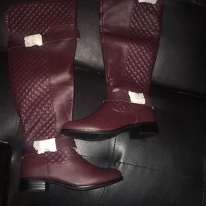 Brown knee high boots